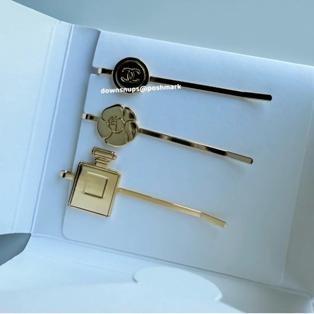 Chanel 3 pc gold hair pin set